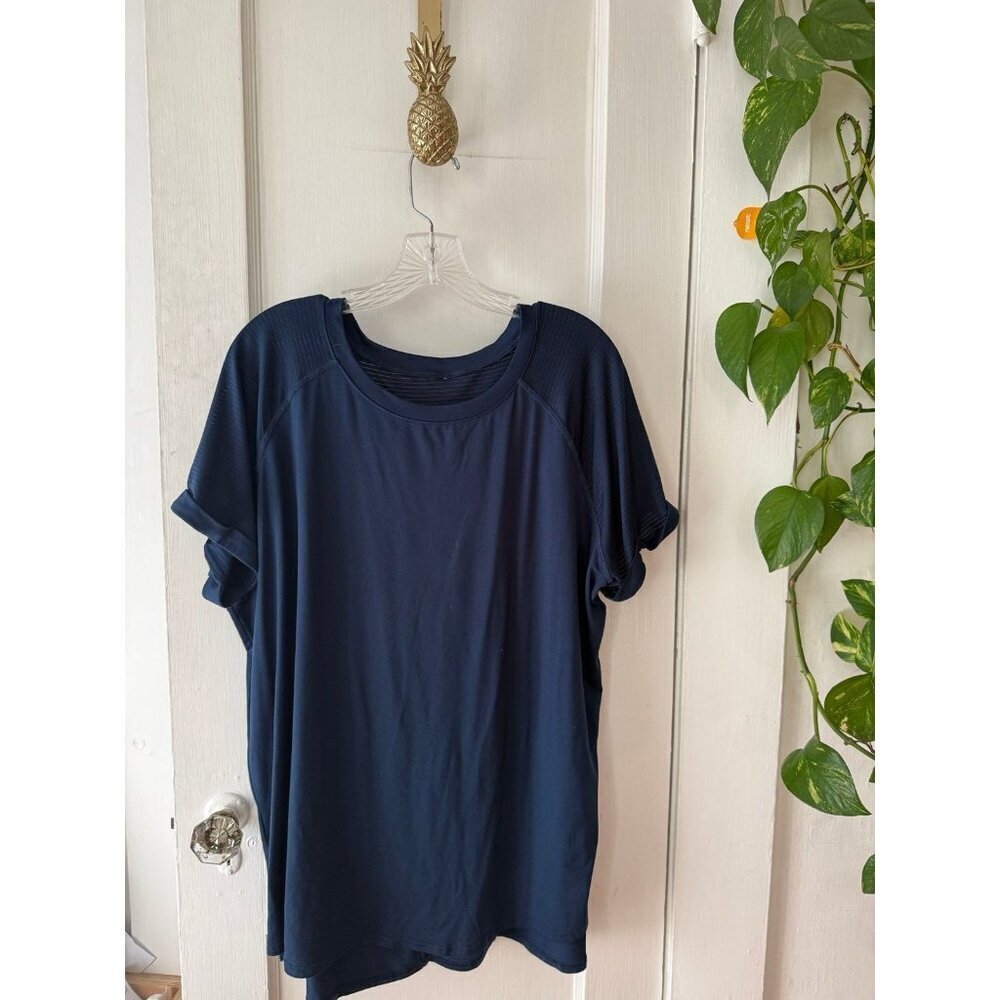 X – large women’s blue athletic top